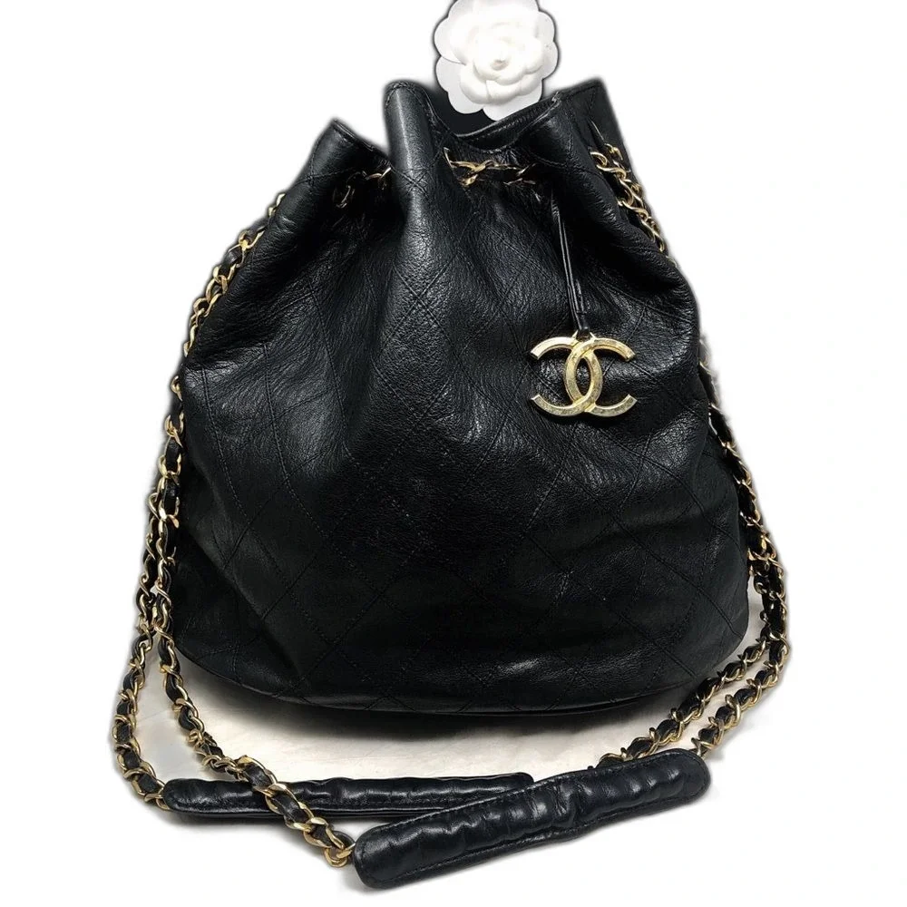 Vintage Chanel Black Lambskin Quilted CC Drawstring Bucket Bag Leather Backpack